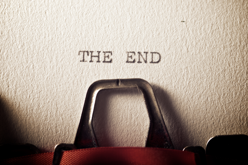 a typewriter page that reads "the end"