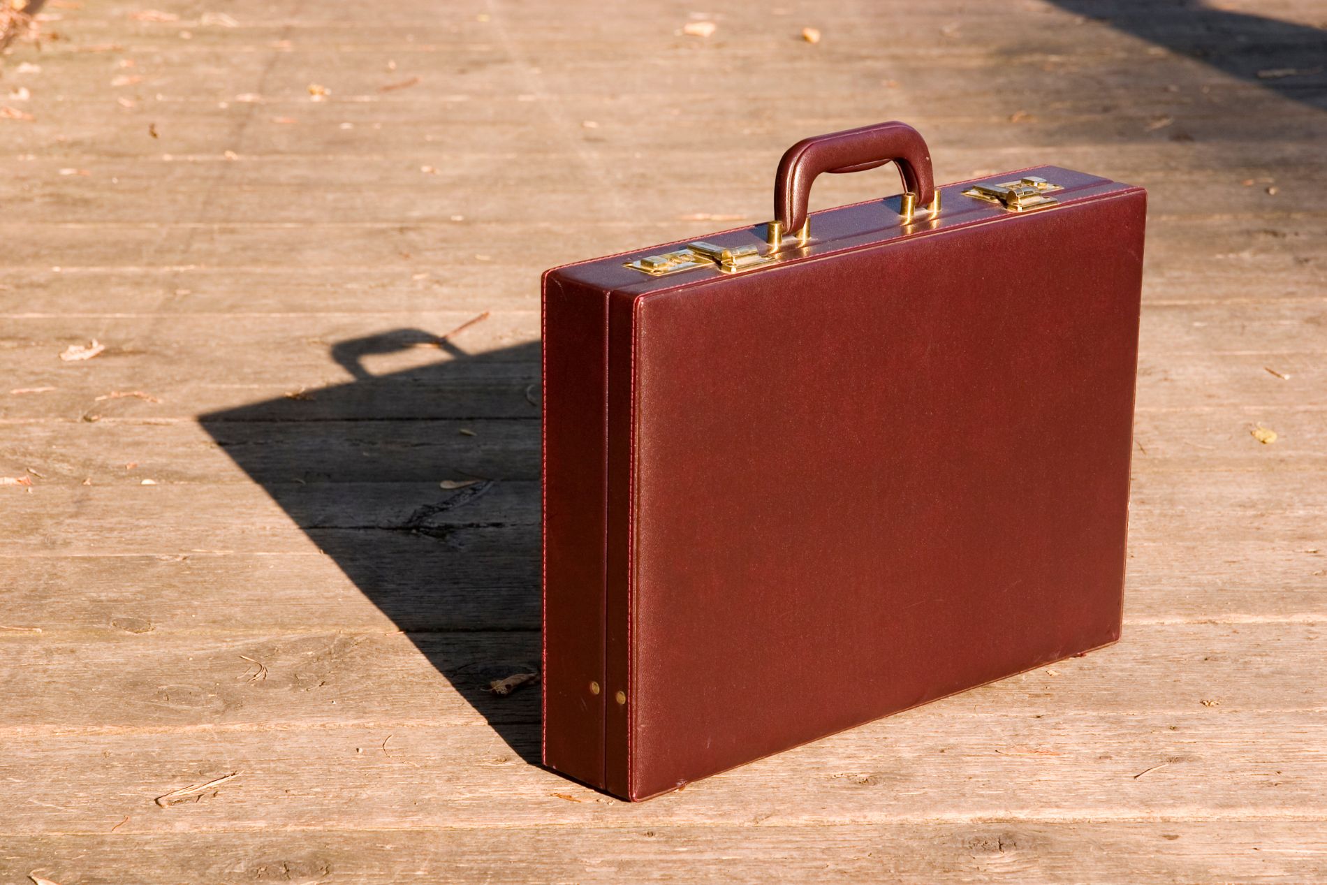 a red briefcase on the floor